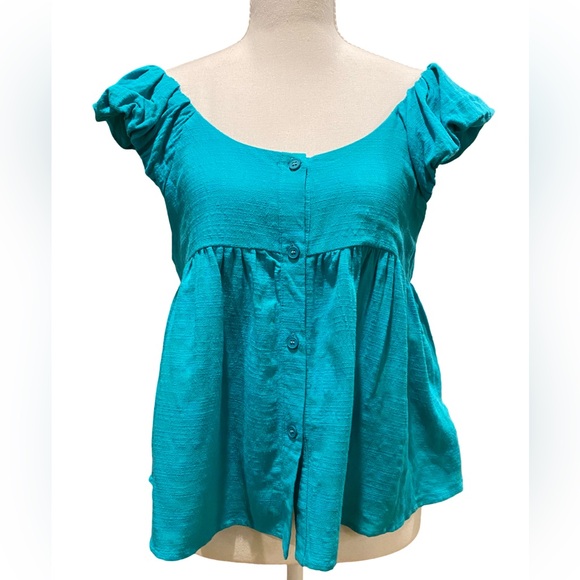 new in Tops - Boutique Top. Turquoise Ruffled Sleeve Button Full Down
